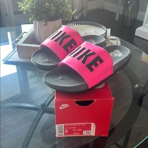 Nike Women's Slippers in Vibrant Pink and Black